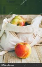 depositphotos_225337926-stock-photo-apples-reusable-canvas-grocery-bag.jpg
